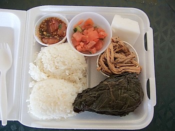 Hawaiian plate lunch - photo by hellochris via Creative Commons A traditional Hawai'ian plate lunch featuring Pork Lau Lau (bottom right)