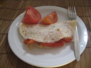 Cajun Style Egg White Omelet with Bell Pepper, Onion, Turkey Sausage & Roasted Roma Tomato